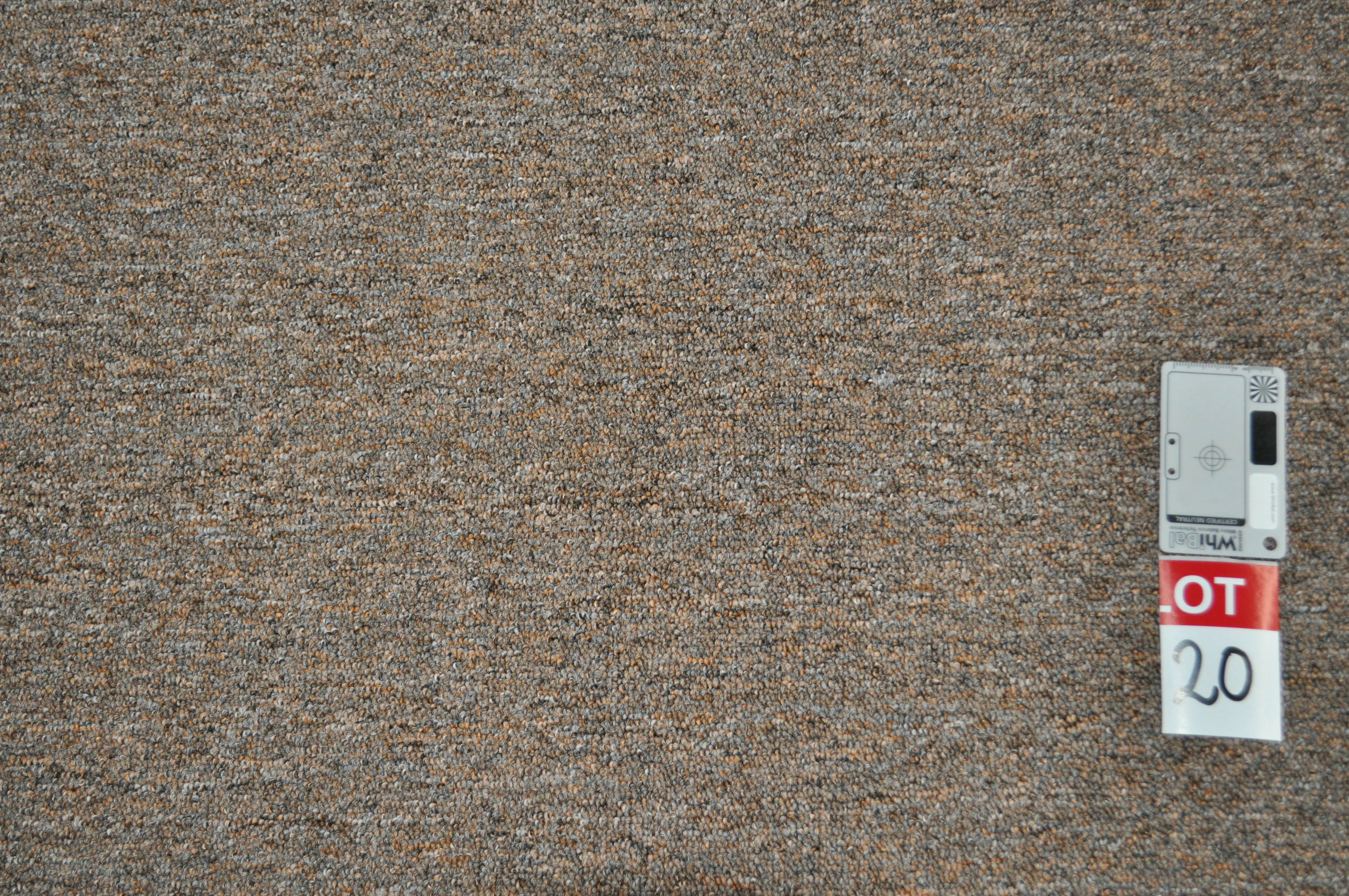 a sample of a polypropolene carpet of cheap price, orange color in the warehouse of Concord Floors and supplied to the public 
	by Concord Floors.