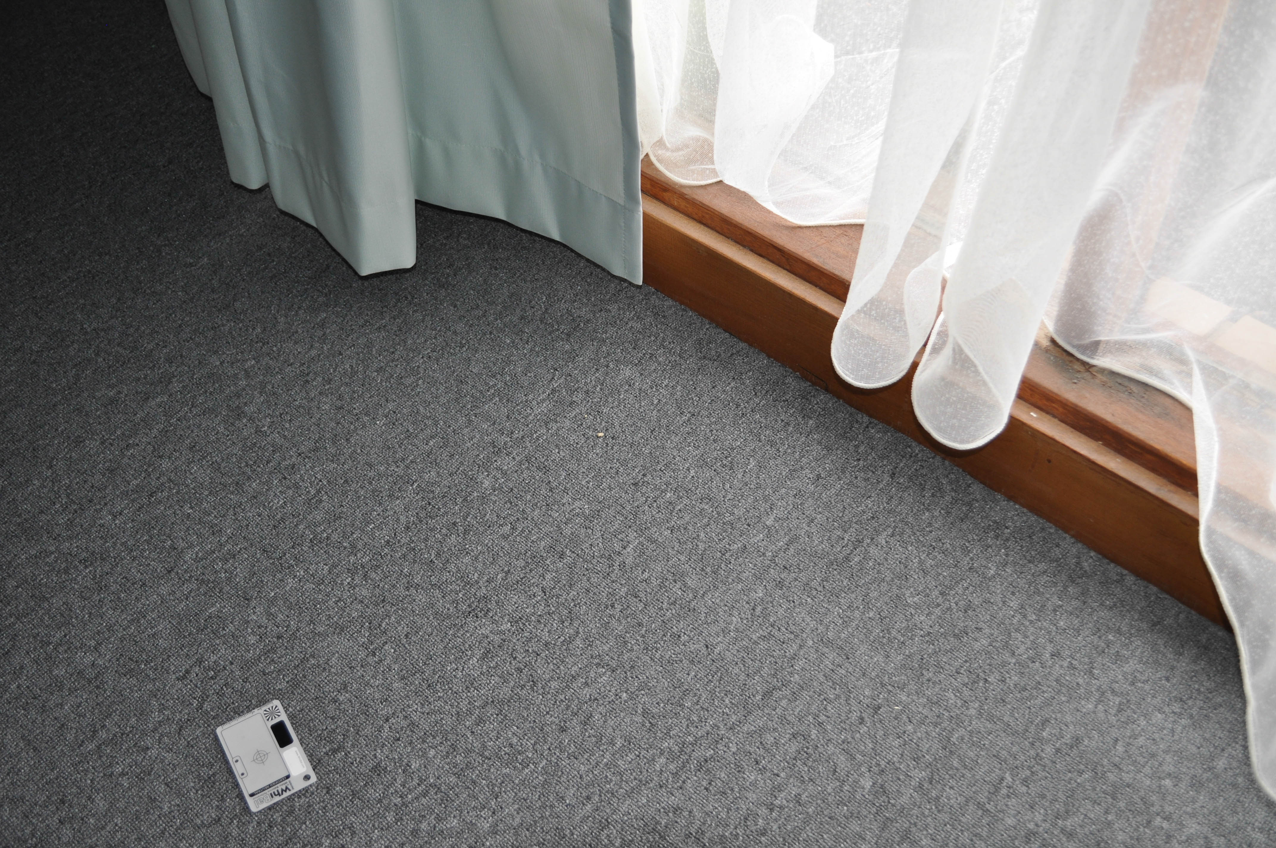 showing a bedroom which has its floor covered by a patterned carpet in a home in Melton which was installed by Concord Floors. The carpet and
 its color belong to a range of carpets which are available to the public to buy from Concord Floors. The carpet range is Kalisari and the carpet is for sale to the
 public.